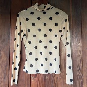 Polka dot mesh turtleneck top